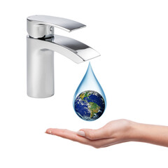 Wall Mural - Concept of water scarcity in the world. Earth in a drop of water dripping from the faucet to the hand. Elements of this image furnished by NASA