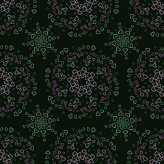 Wall Mural - Seamless pattern of pink and green hearts flowers on a green background. Print with hearts in kaleidoscopic ornamental style.