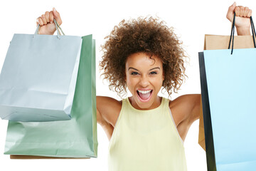 Wall Mural - Shopping, retail and black woman customer excited with sale or deal isolated against a studio white background. Portrait of happy, fashion and joyful winner celebrating holding bags at a giveaway