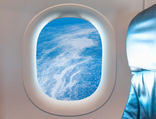 Wall Mural - View from airplane of melting polar ice cap Greenland as seen through window of an commerical passenger airplane