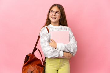 Poster - Student little girl over isolated pink background thinking an idea while looking up