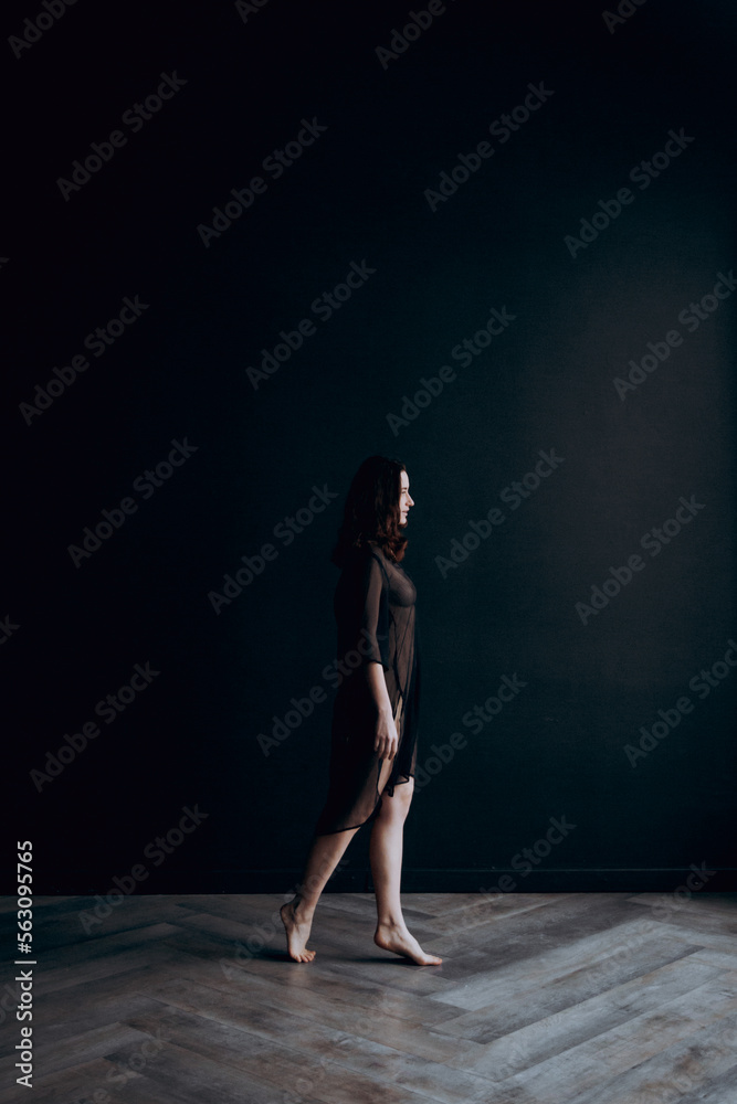 Beautiful, natural naked girl artistic posing at a stylish and