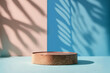 A wooden podium with a pastel-colored, wall background with leaf shadows, studio photography, minimal