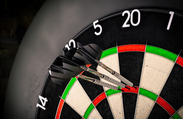 three darts triple twenty on professional sisal steeldart. perfect 180 highscore shot dart game hobb