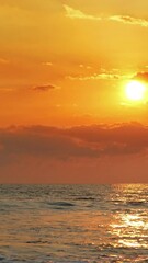 Wall Mural - beautiful landscape with tropical sea sunset on the beach. vertical video