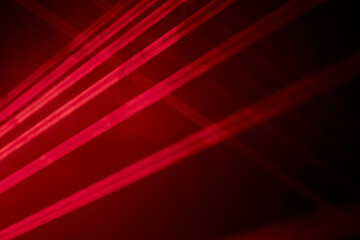 bright red neon laser lights illuminate the darkness creating lines and triangle shapes in sci-fi ef