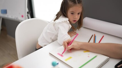 Poster - Teacher and toddler having planets lesson at classroom