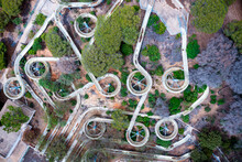 Aerial View Of An Abandoned Old Gloomy Water Park Due To Bankruptcy. Taken From A Drone Sunny Day. Abstract