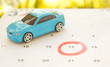 © maew - Due date car finance concept. car is located on the calendar.