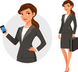 Attractive young businesswoman holding a cell phone or a briefcase