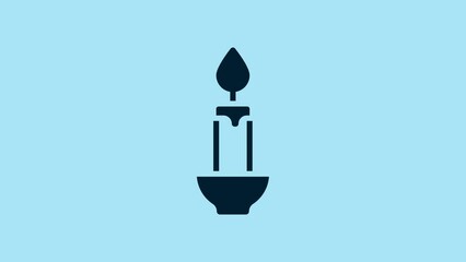 Wall Mural - Blue Burning candle icon isolated on blue background. Cylindrical candle stick with burning flame. 4K Video motion graphic animation