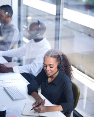 Poster - call center, customer support with a happy black woman consultant working in her telemarketing offic