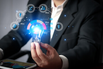 Poster - businessman hand holding light bulb global internet connection. business global internet connection 