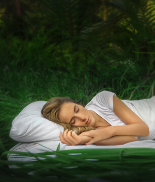 Fototapete - A hidden place. Sleeping woman in deep jungle forest lies on airbed