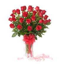 Bouquet Of Red Roses In A Glass Vase With A Pink Ribbon