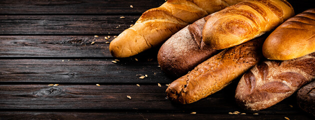 Wall Mural - Different types of fresh crispy bread. 