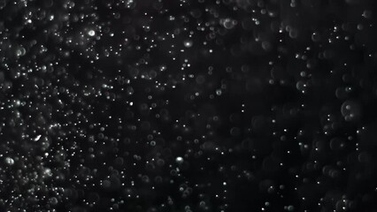 Wall Mural - Abstract background with animation of flying and flickering particles as bokeh of light. Animation of seamless loop.Dust bubbles snow animation.Bokeh Shiny Particles Loop Animation.