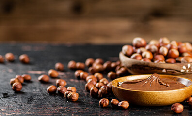 Canvas Print - Hazelnut butter in a plate on the table. 