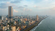Colombo city with buildings and streets at sunset. Sri Lanka.