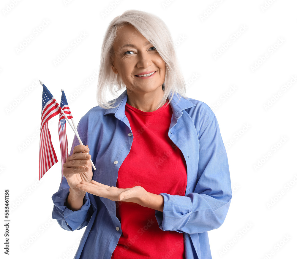 Mature woman with USA flags on white background