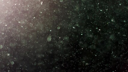 Wall Mural - Abstract background with animation of flying and flickering particles as bokeh of light. Animation of seamless loop.Dust bubbles snow animation.Bokeh Shiny Particles Loop Animation.