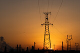 Fototapeta  - high-voltage power lines at sunset,high voltage electric transmission tower