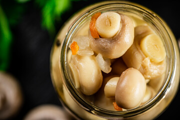 Poster - An open jar of homemade pickled mushrooms. 