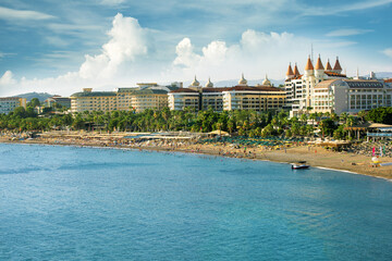 Wall Mural -  Beach on Turkish riviera in beautiful summer day.  Vacation and holiday in Turkey.