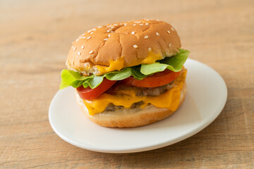 Wall Mural - pork burger with cheese on plate