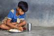 © paltu - girl Student having mid day meal at school