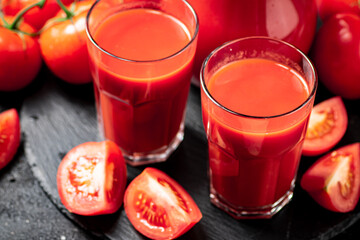 Poster - Tomato juice on a stone board. 