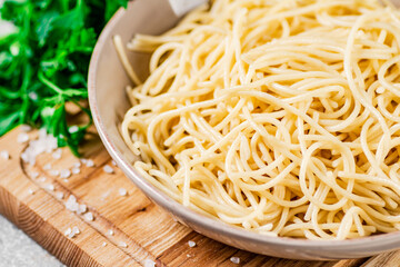 Poster - Boiled spaghetti in a plate with parsley. 