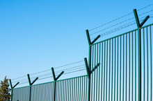 Fence With Barbed Wire. Refugees Fence Camp Migration Border.
