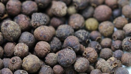 Poster - natural black pepper peas rotate in a circle. hot spice