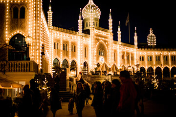 castle lit at tivoli in copenhagen, denmark