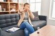 © Krakenimages.com - Young woman working at consultation office covering eyes with hands and doing stop gesture with sad and fear expression. embarrassed and negative concept.