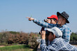 © Sophon_Nawit - Asian boys are using binoculars to do the birds' watching in tropical forest during summer camp, idea for learning creatures and wildlife animals and insects outside the classroom.