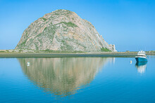 The Morro Rock's  Reflection On Calm Waters