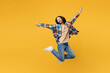 © ViDi Studio - Full body young fun carefree overjoyed woman wear blue shirt beige t-shirt jump high with outstretched hands look camera isolated on plain yellow background studio portrait. People lifestyle concept.