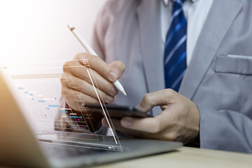 Fototapete - Male manager managing business planning project schedule in the office. Gantt chart showing on virtual screen.	
