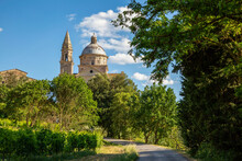 Italy, Tuscany, Montepulciano, Green Trees Surrounding Footpath Leading To San Biagio Church