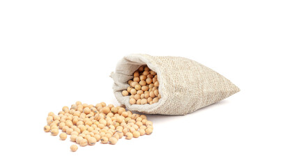 Wall Mural - Soybeans in a sack bag isolated on white background
