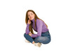 © Asier - Young redhead woman sitting isolated cut out