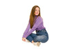 © Asier - Young redhead woman sitting isolated cut out