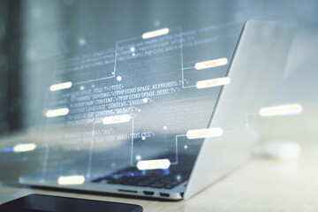 Poster - Double exposure of abstract programming language on laptop background, research and development concept