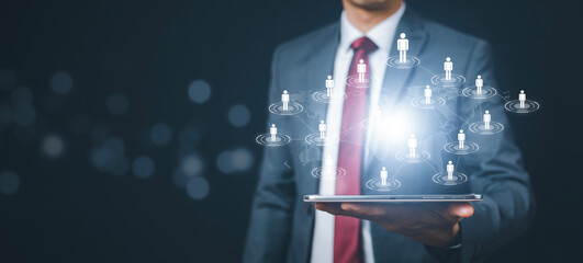 Poster - Businessman press human social button modern on virtual background global network of infrastructure and customer connection information exchange on white background, technology social network button