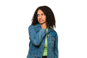 Wall Mural - Young african american curly woman isolated touching back of head, thinking and making a choice.