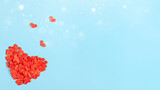 Fototapeta Tulipany - Concept of Valentine's Day, love. Red heart on a blue background
