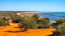 Panorama Of Shark Bay In Francois Peron National Park Near Monkey Mia In Western Australia; Red Cliffs Over The Ocean In The Australian Outback