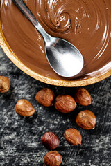 Canvas Print - Hazelnut butter in a plate with a spoon. 